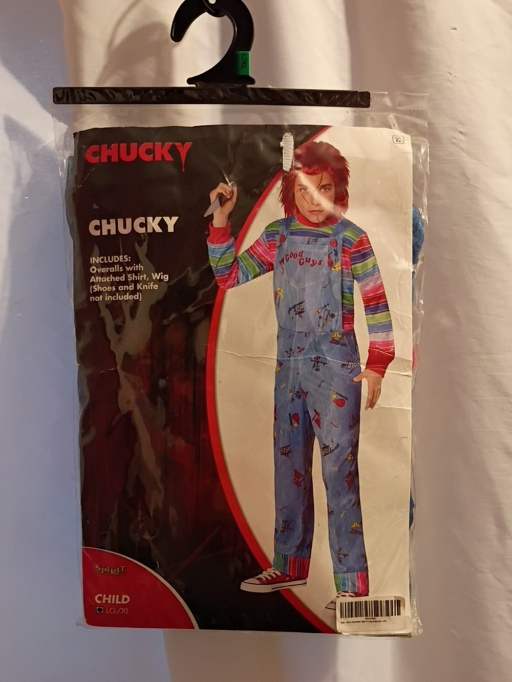 Spirit Child Costume Packaging in Red and Gold